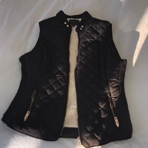 Classy, edgy black puffer quilted vest